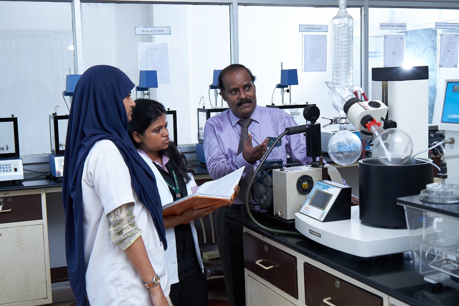 Teacher Explaining to the Students at KK College of Pharmacy