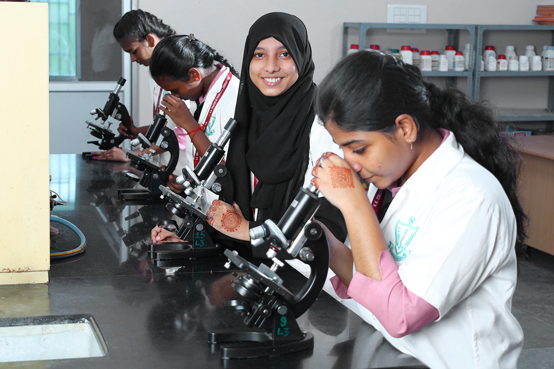 Students working with Microscope in Lab, KK College of Pharmacy